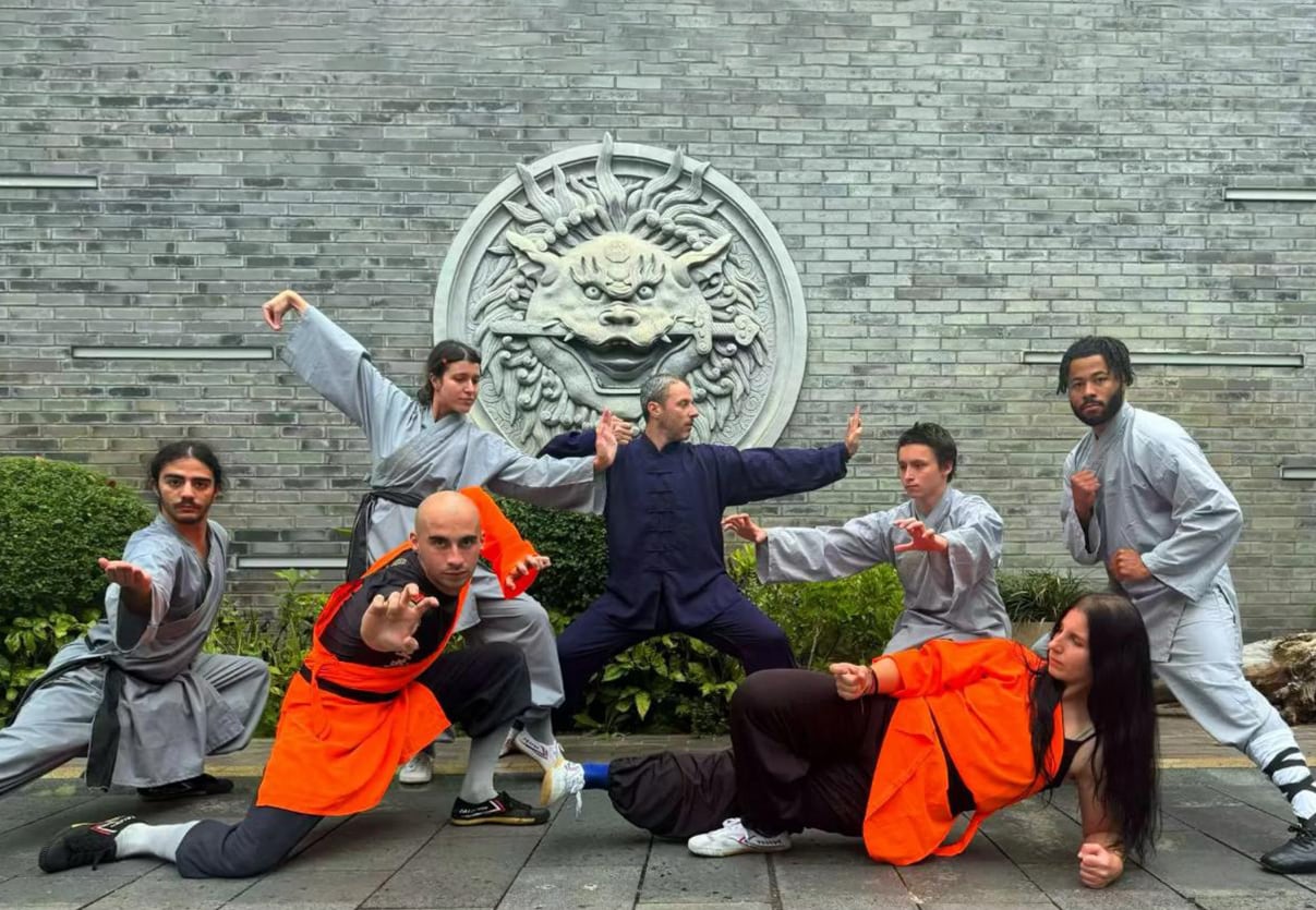 six people doing qigong